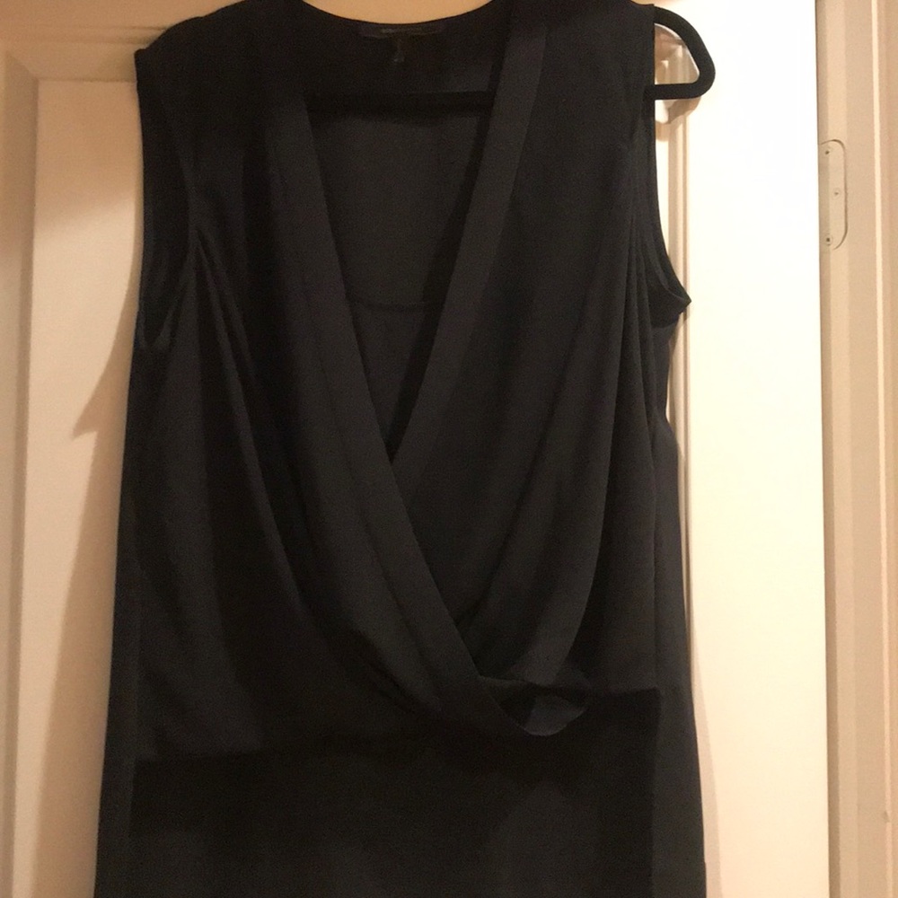 Sleeveless black blouse